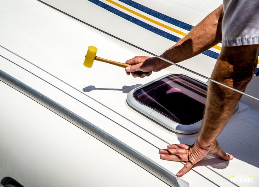 surveyor checking for delamination