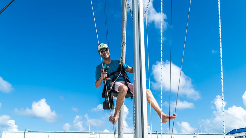 working on the sailboat mast
