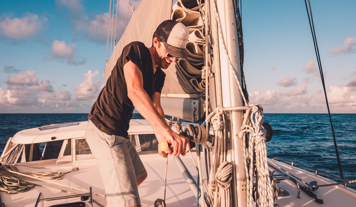 jason wynn winching up the spinnaker