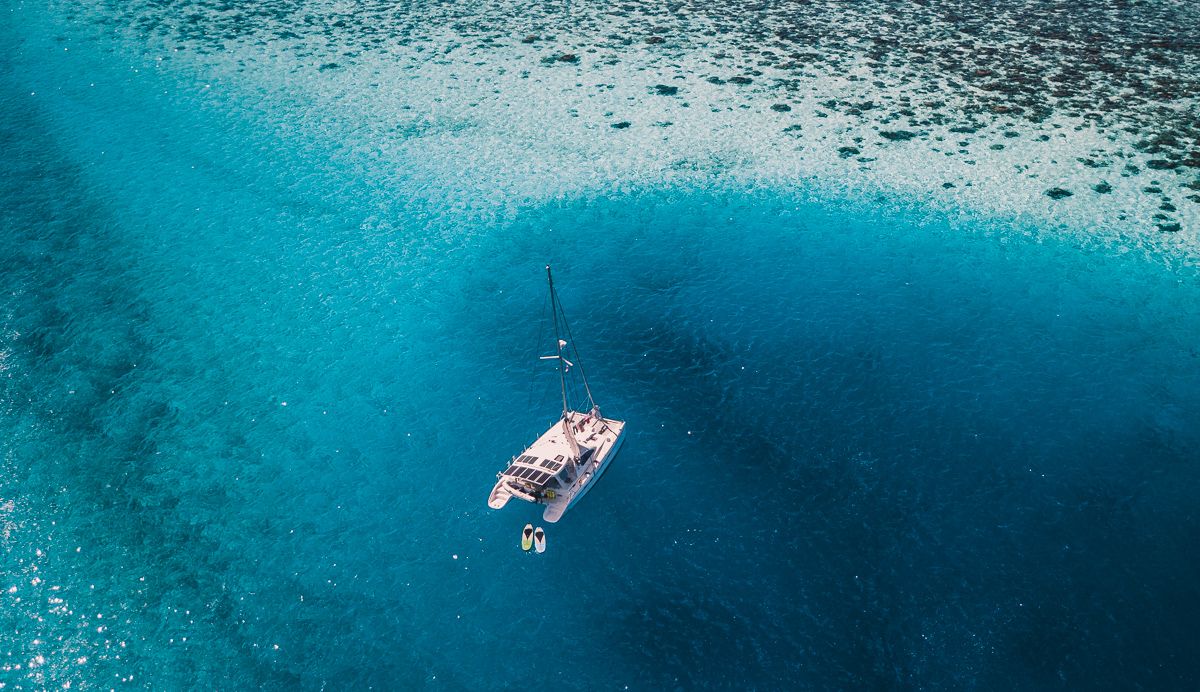 sailing vessel curiosity at anchor in moorea french polynesia