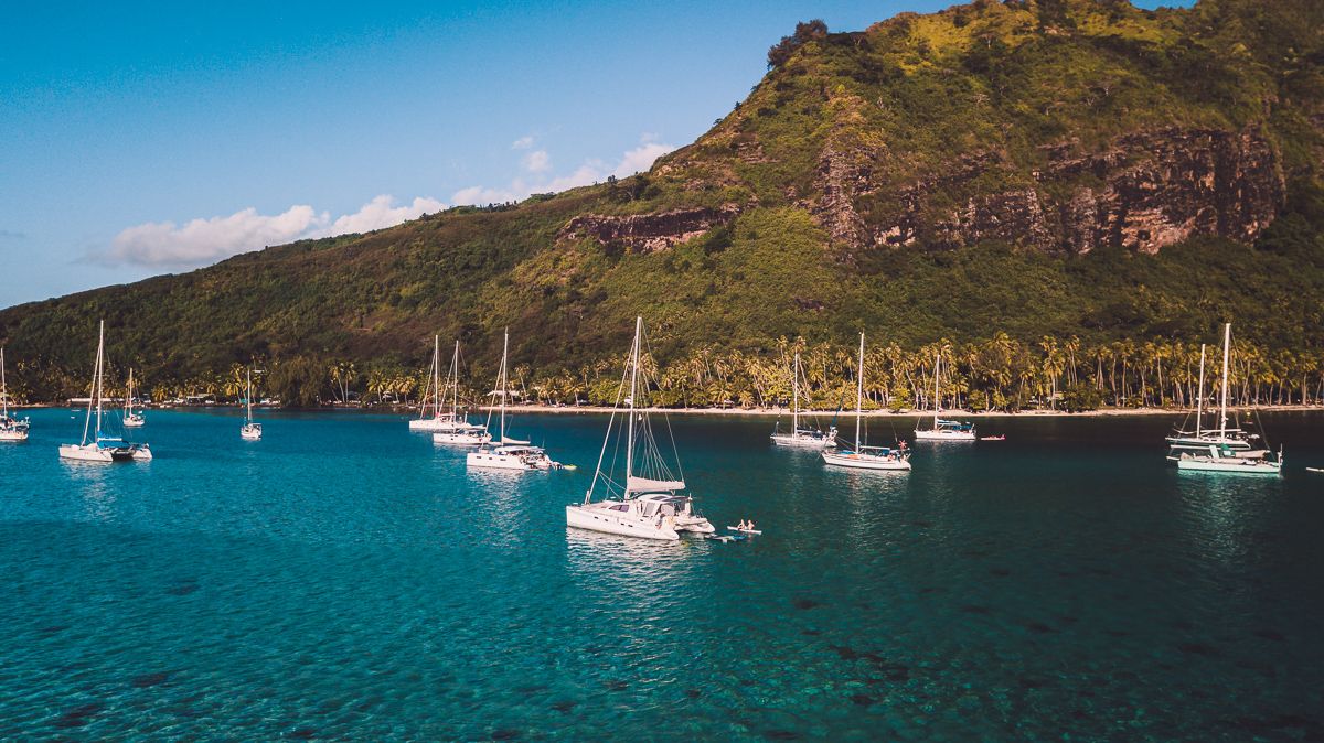 sv curiosity anchored in moorea, french polynesia