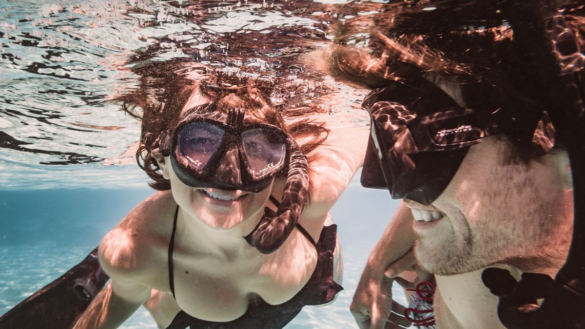 nikki and jason wynn loving the snorkeling in moorea french polynesia