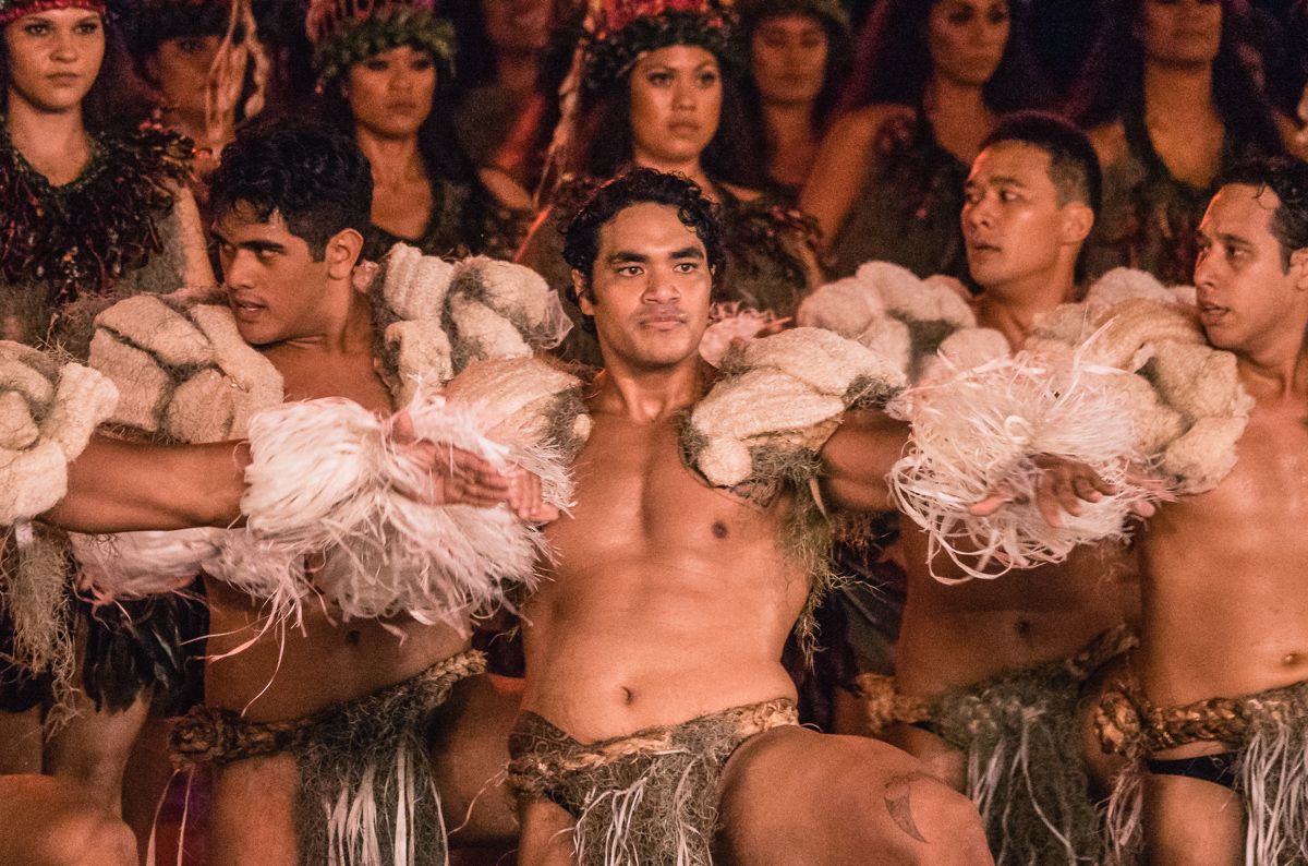 tahitian men performing cultural dance