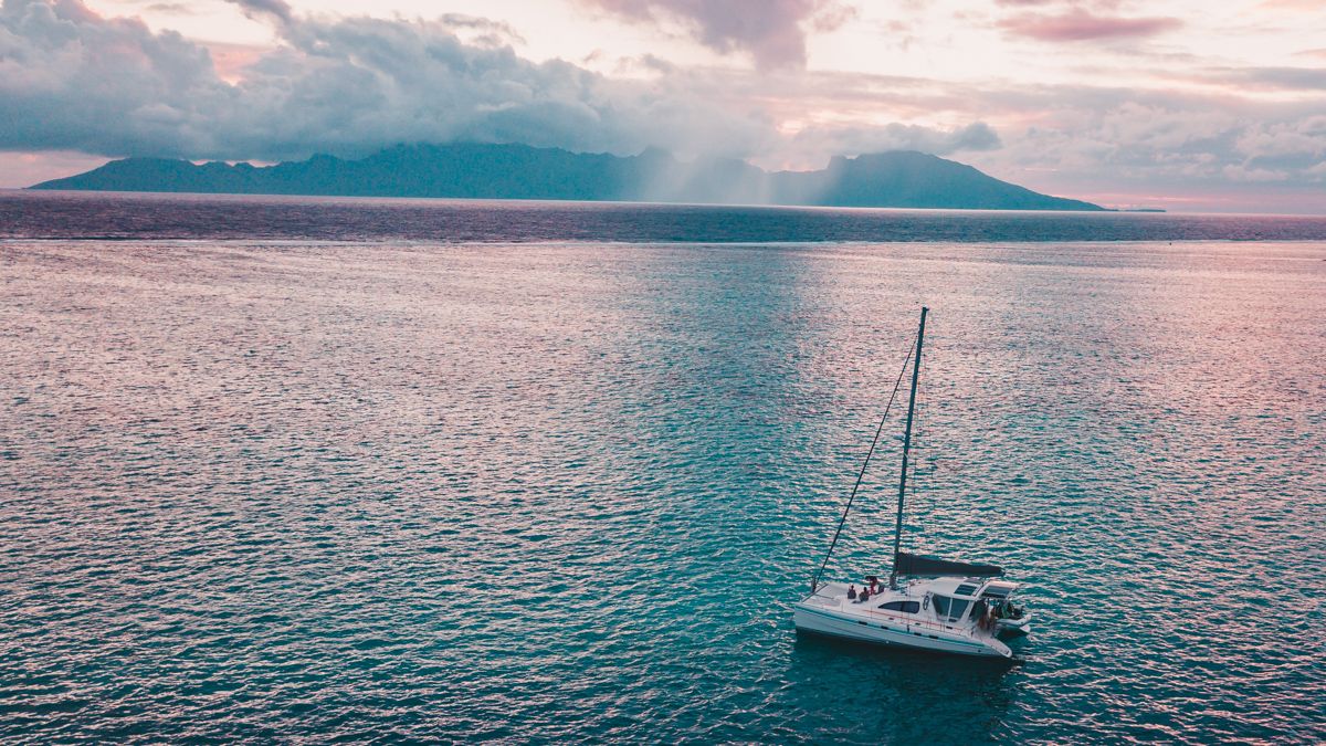 Sherbet Colored tropical sunset in tahiti