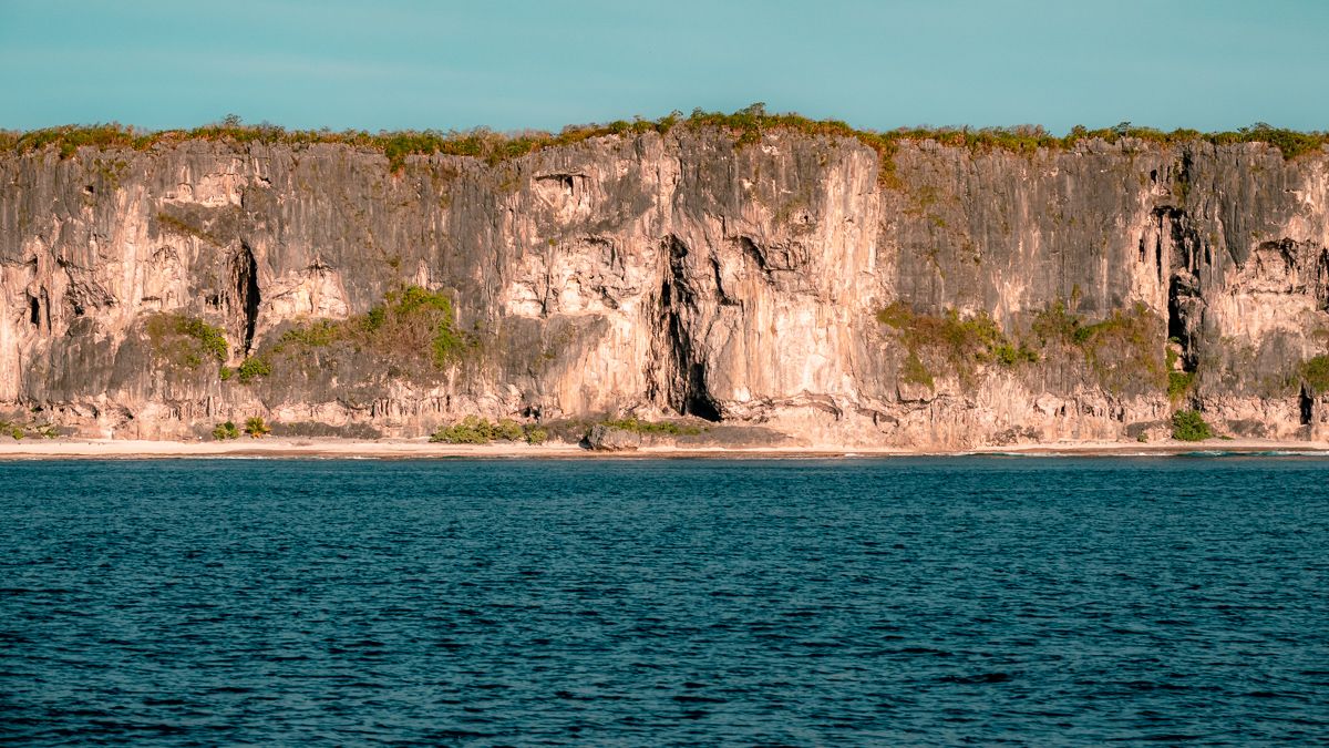 Sailing and beautiful views of Makatea in the Tuamotu archipelago