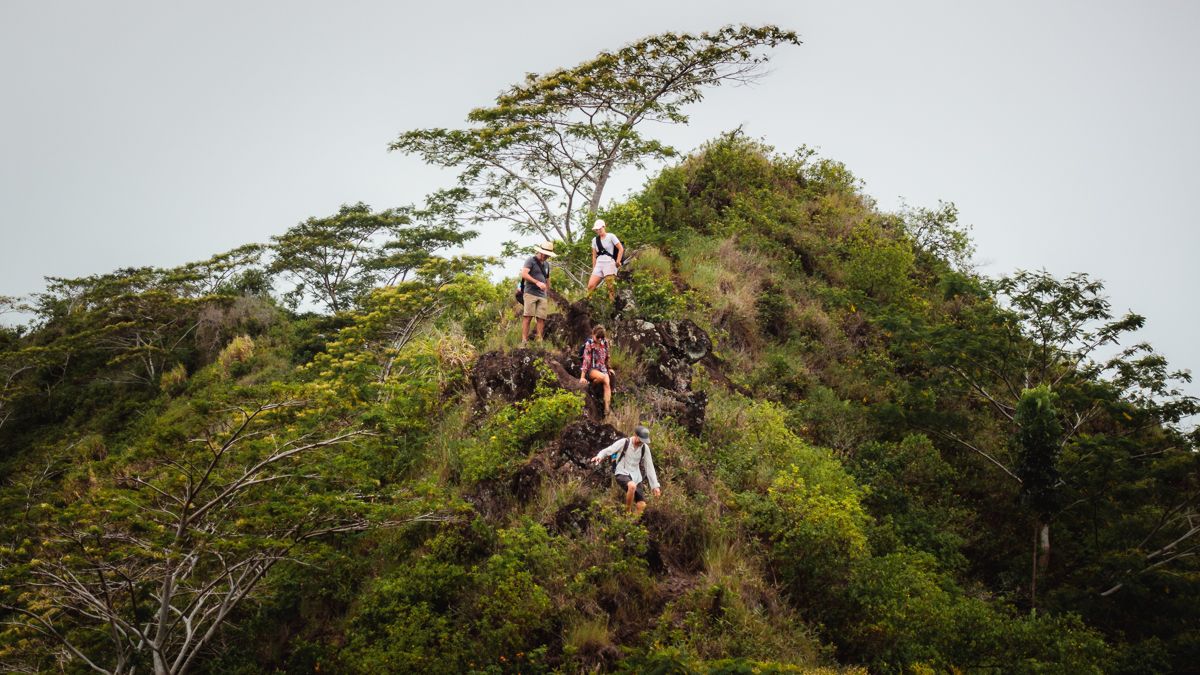 jason and nikki wynn with nick and terysa hiking and sailing in french polynesia