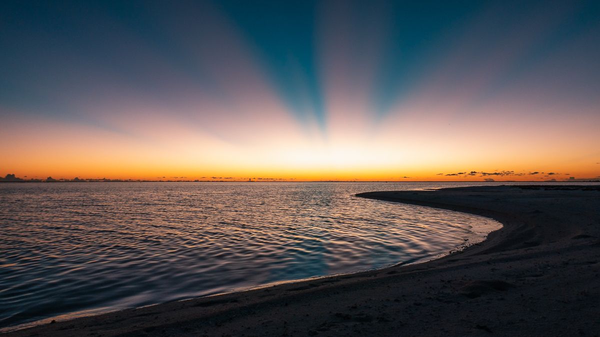 stunning sunset on a remote atoll in south pacific