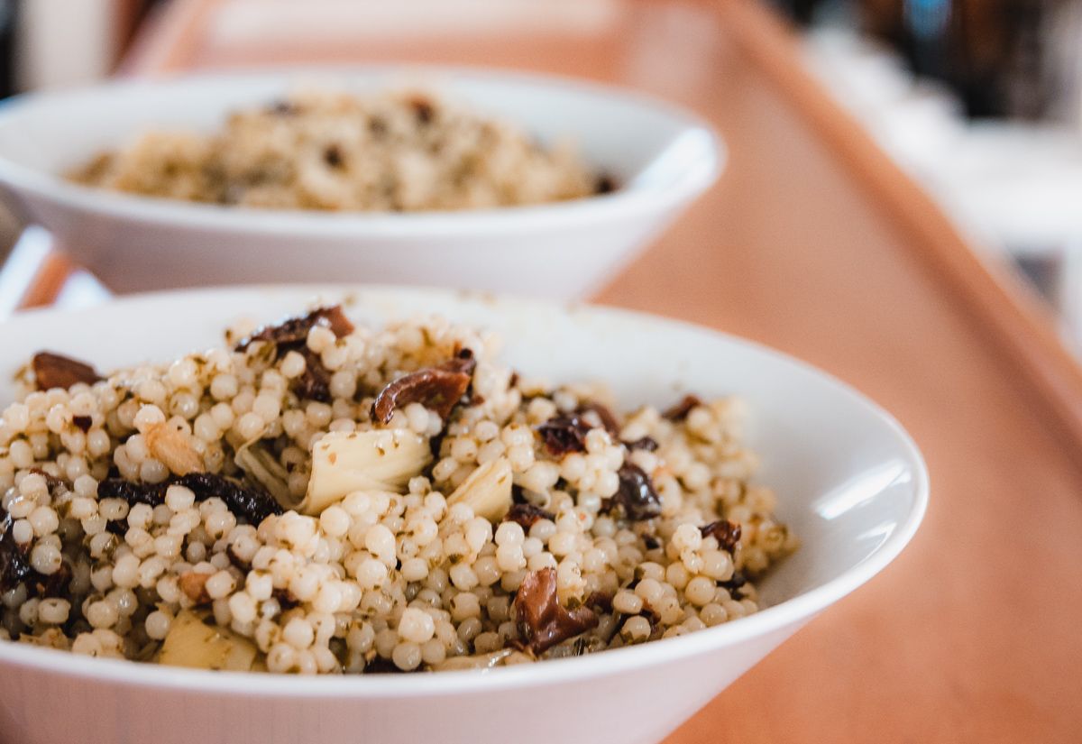 fresh pearl pasta dish with mushroom and sun dried tomatoes