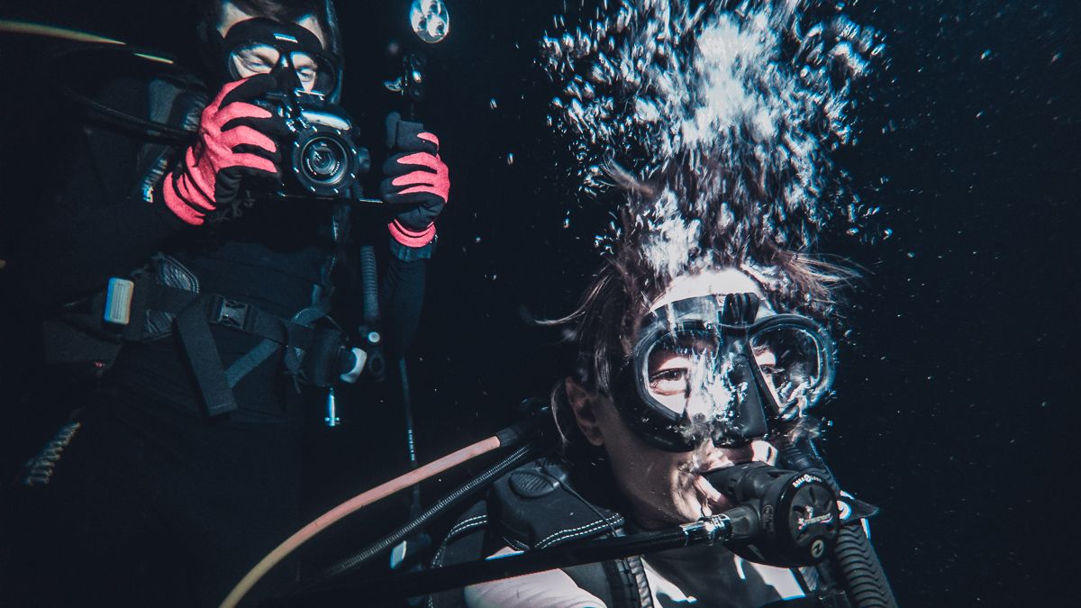 Jason and Nikki Wynn night diving in Fakarava south pacific