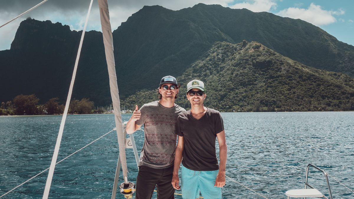 jason and jacob aboard s/v curiosity in moorea french polynesia