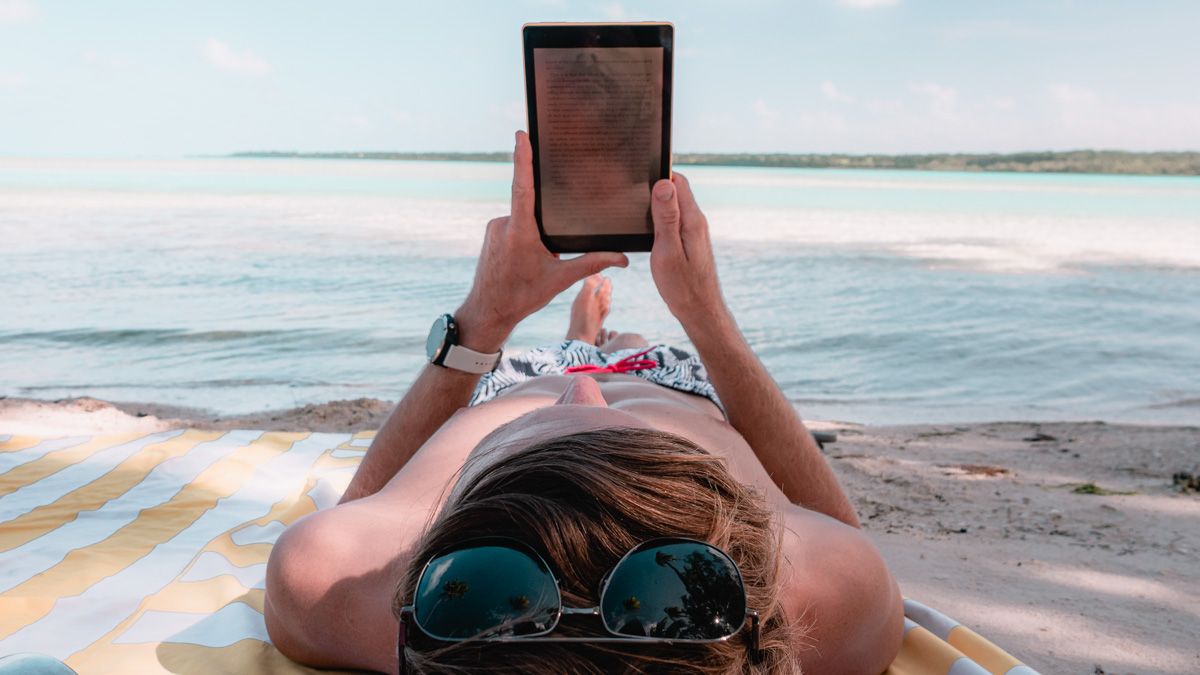 Jason Wynn relaxing, reading and enjoying the peace of the island life