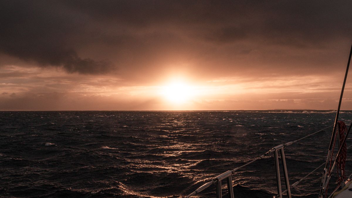 sunset over the atoll at palmerston island in the cook islands