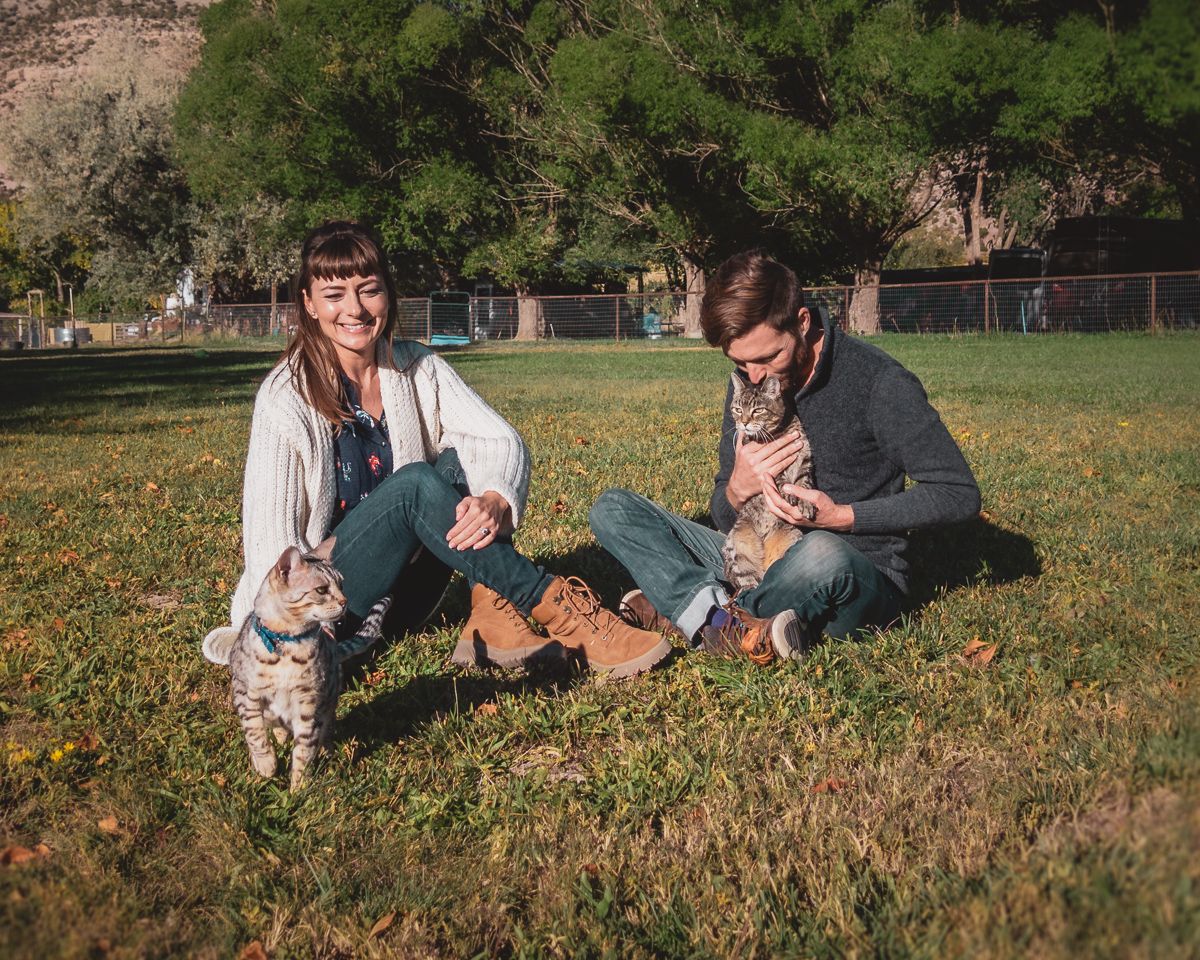 the wynns and furry felines cleo and singa posing for one last photo