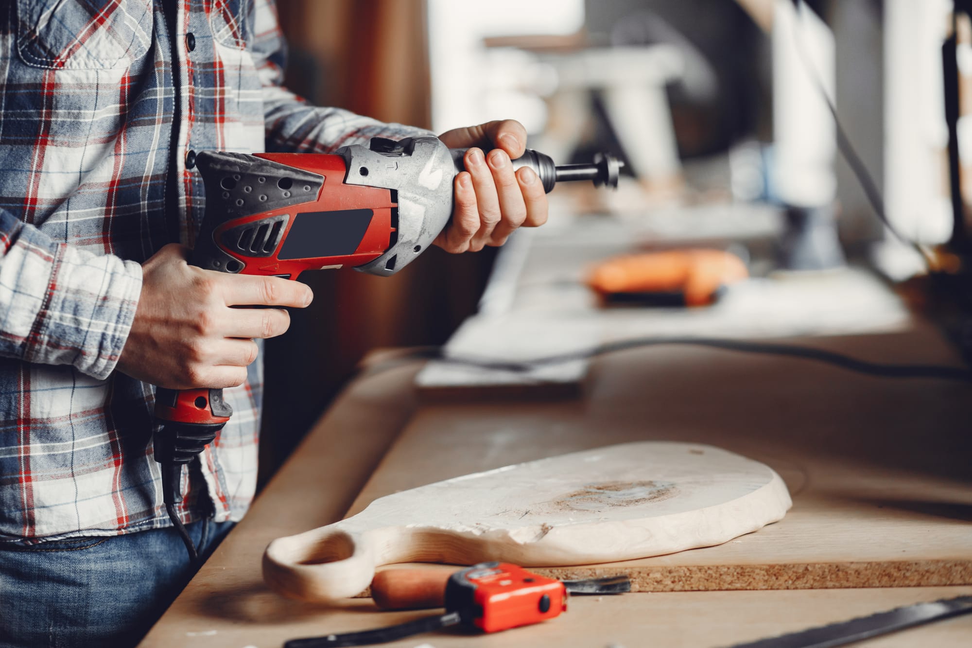 carpenter-works-with-tree.jpg