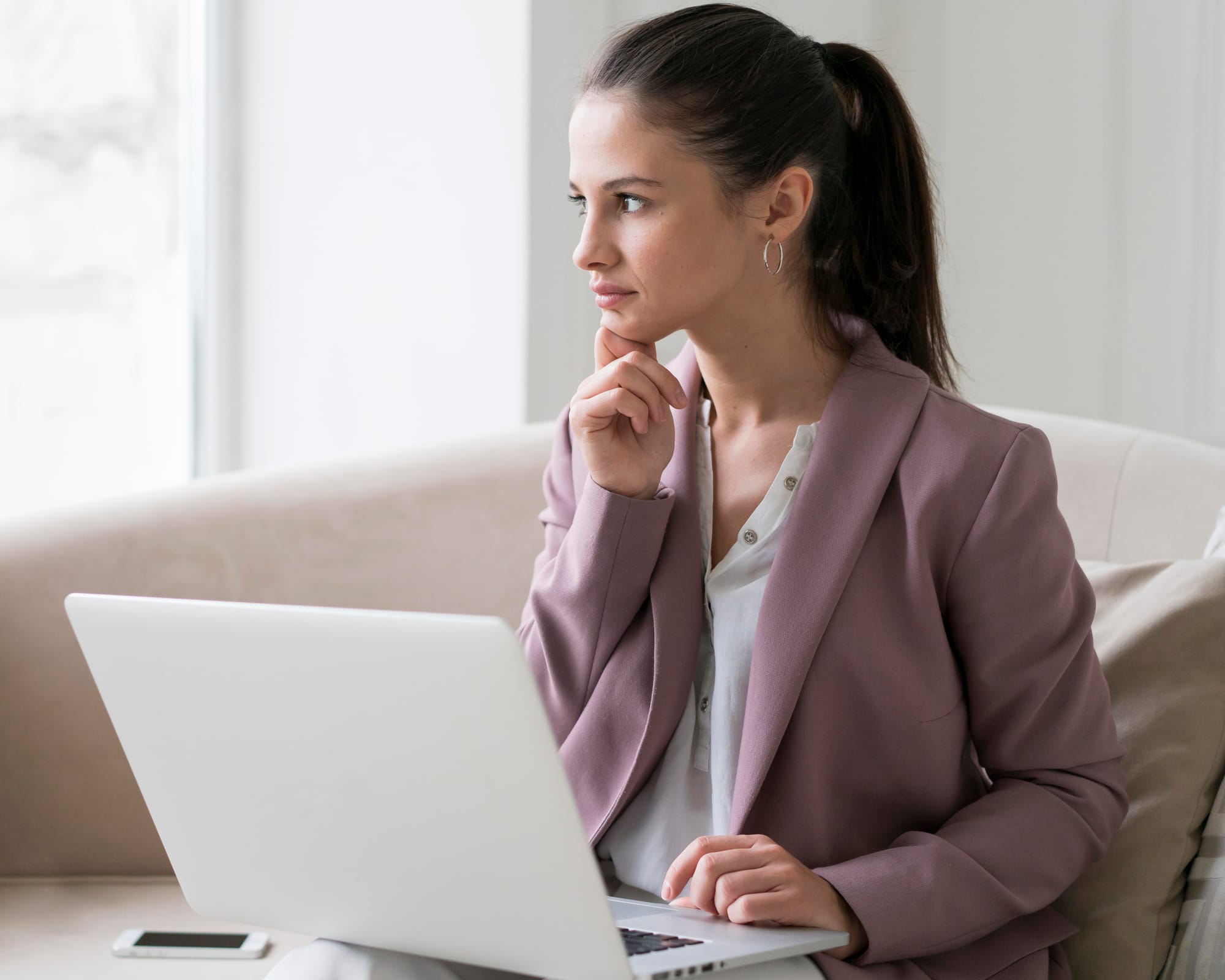 Young woman strategizing her business' automated workflow