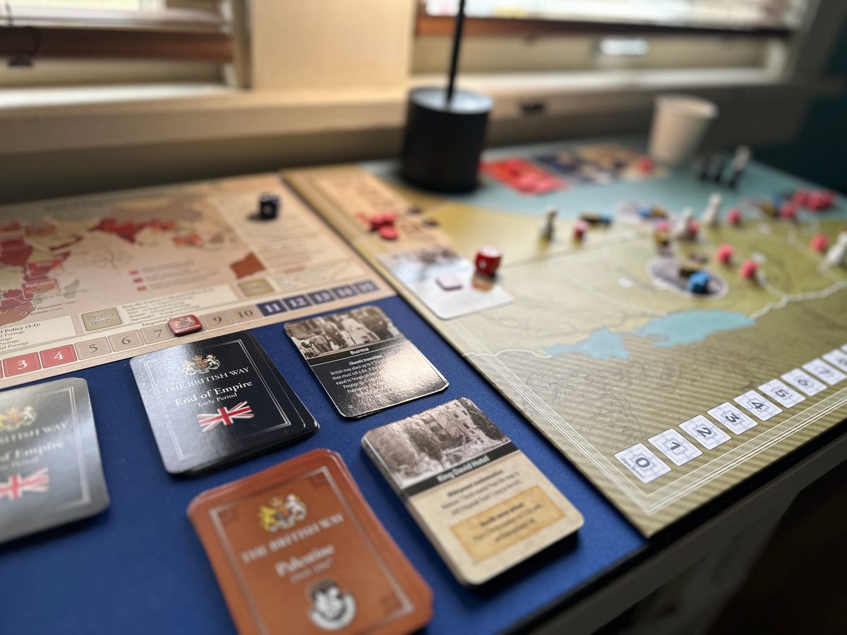 The British Way: Counterinsurgency at the End of Empire set up on small table with the End of Empire sideboard and campaign event decks. 