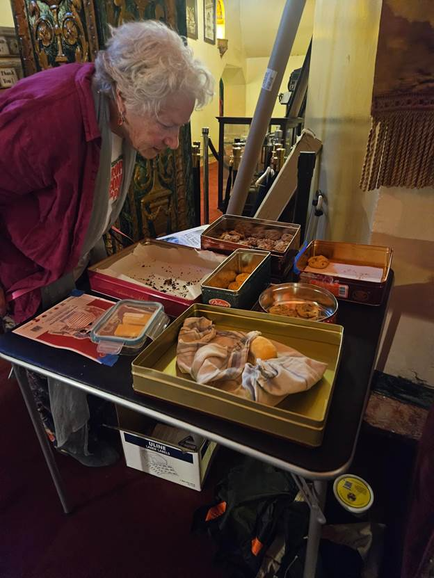 A person looking at food on a table
AI-generated content may be incorrect.