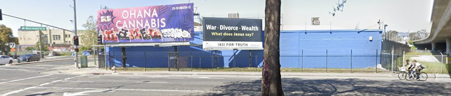 The wall of a St. Vincent de Paul, painted light blue, as if in expectation of a panther mural going up.