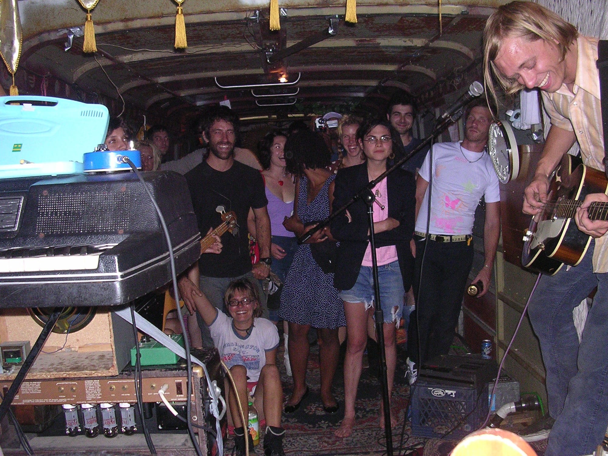crowd watching a show inside the bus