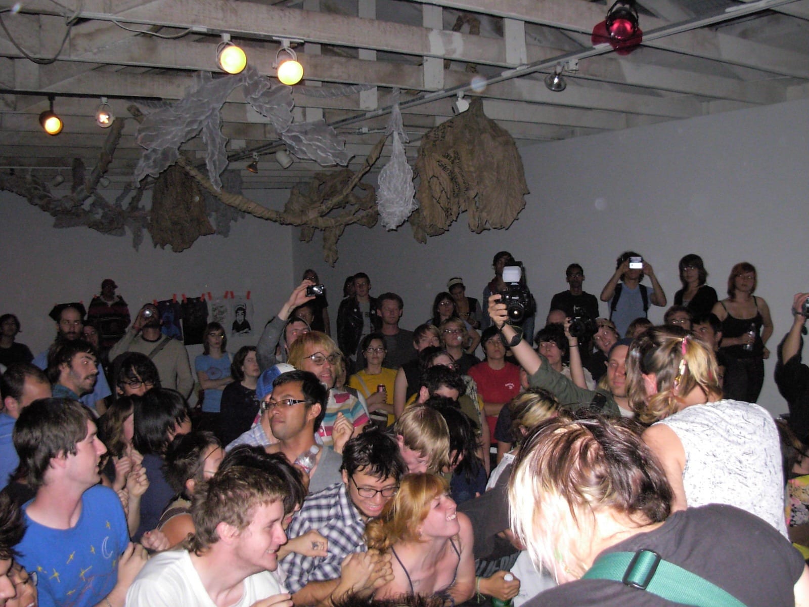 a crowd of people doing something intensely