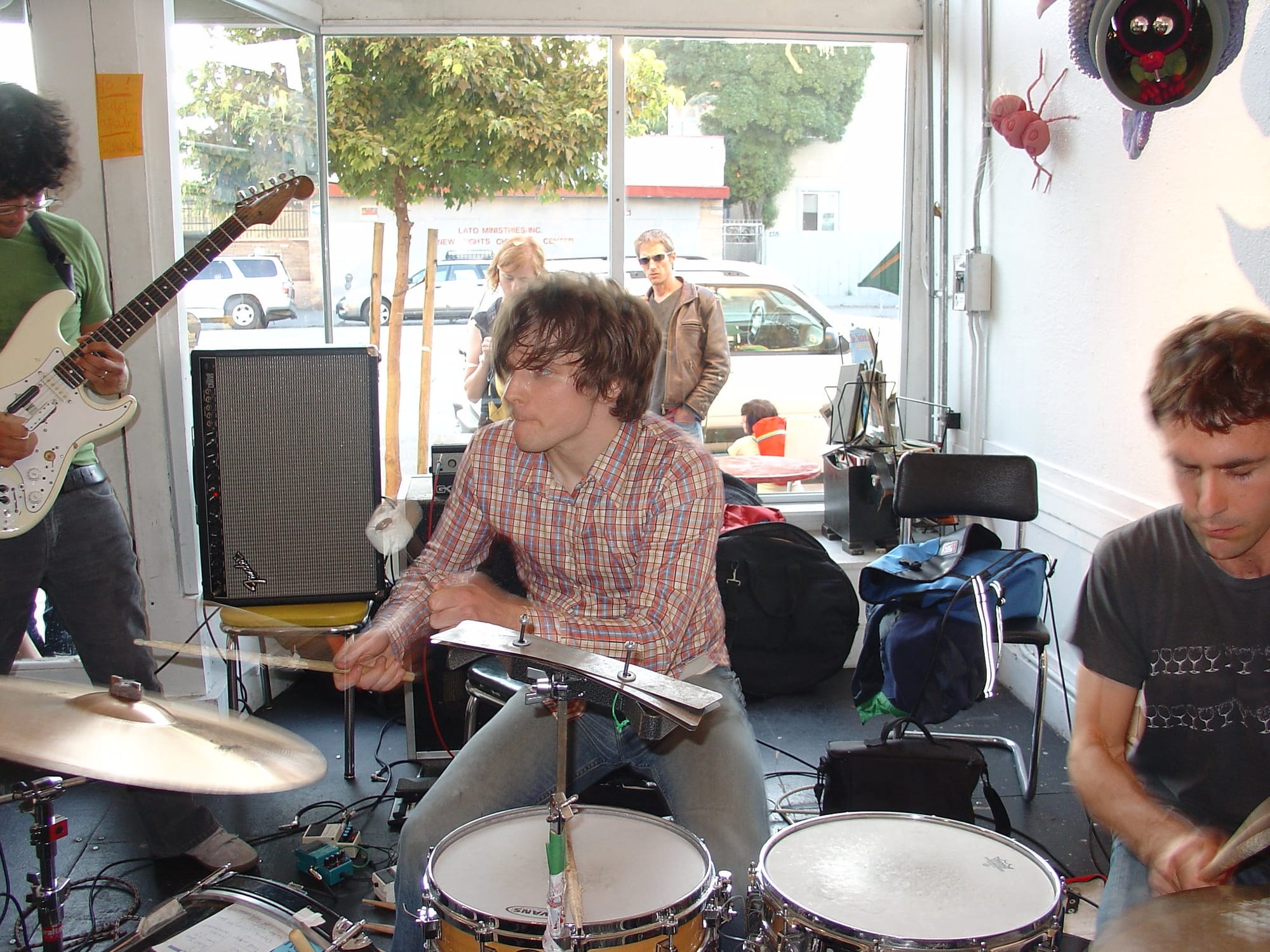 a band playing inside Mama Buzz