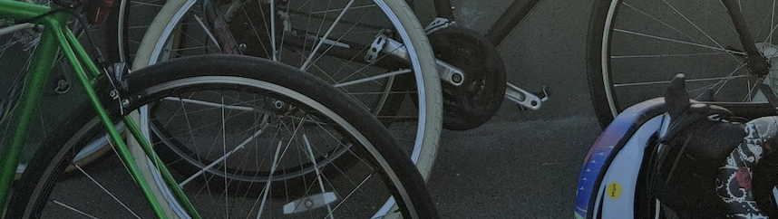 a series of clipped and decontextualized images of bikes leaning against a bridge