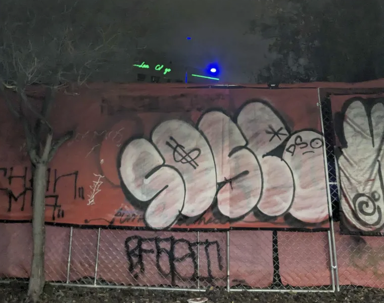 Illegible graffiti on a building