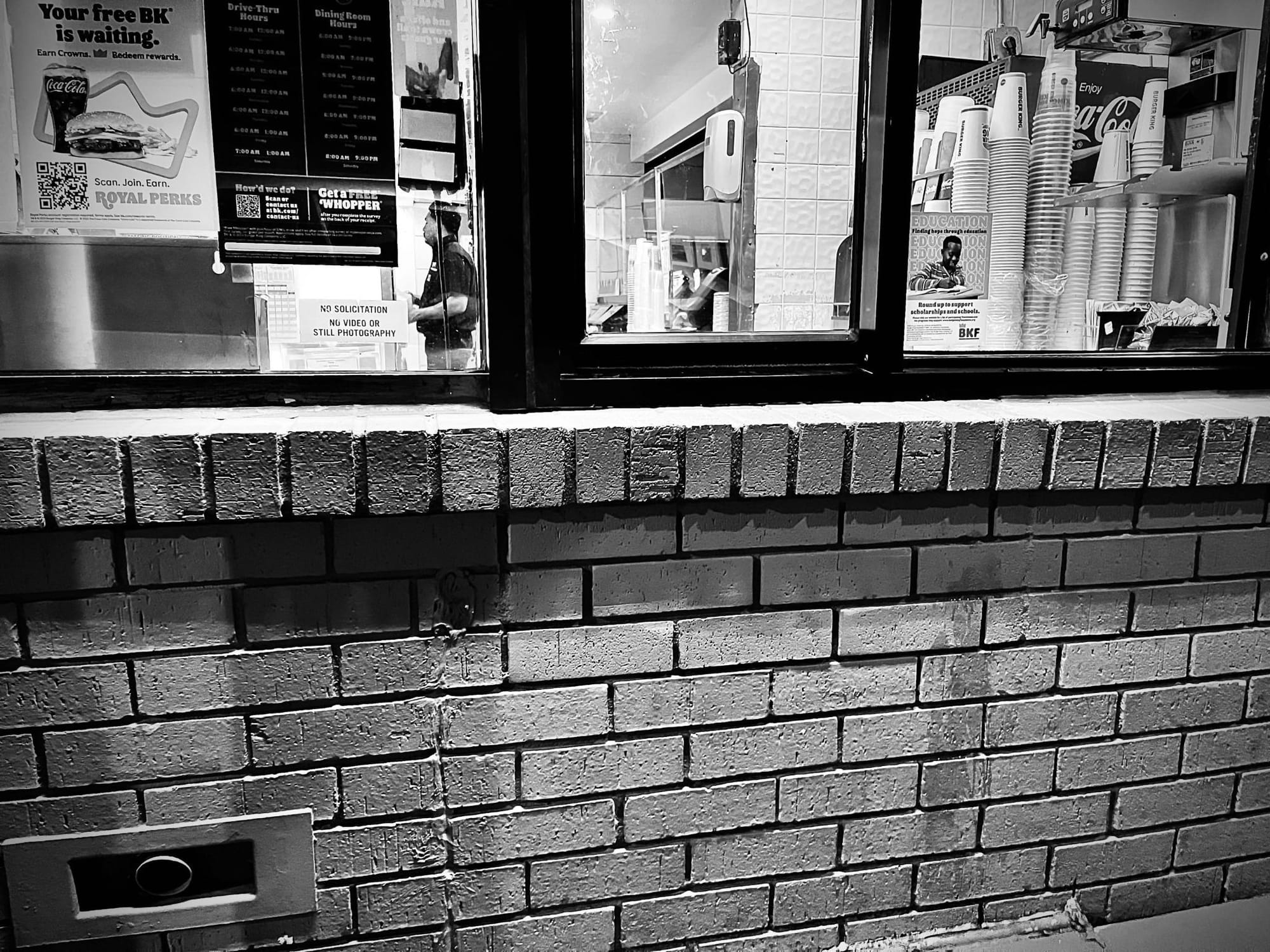 Waiting for an order at the Burger King drive-thru window.
