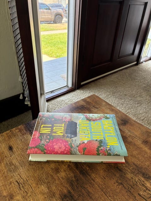 the book, longing for the exit, on a table
