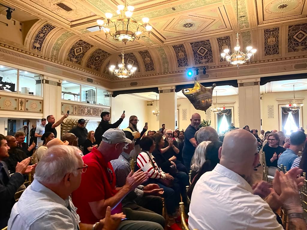 Steve Hilton walks up to the stage