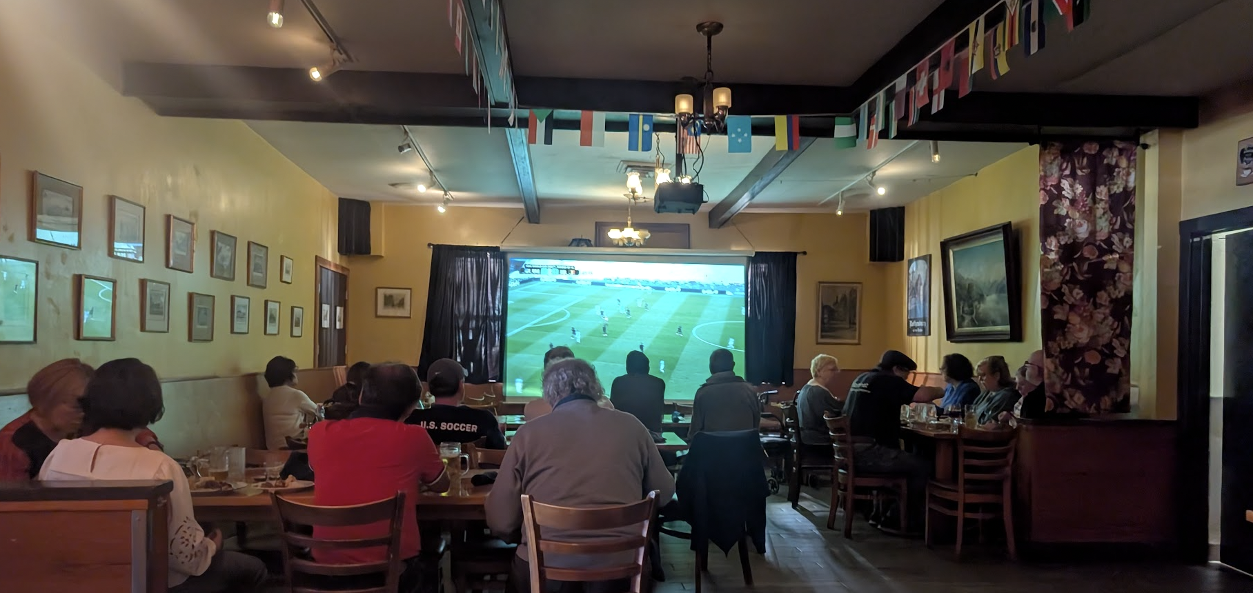 the view of the tv at speisekammer, through heads