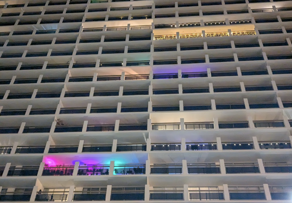 colorful party apartments in a building at night