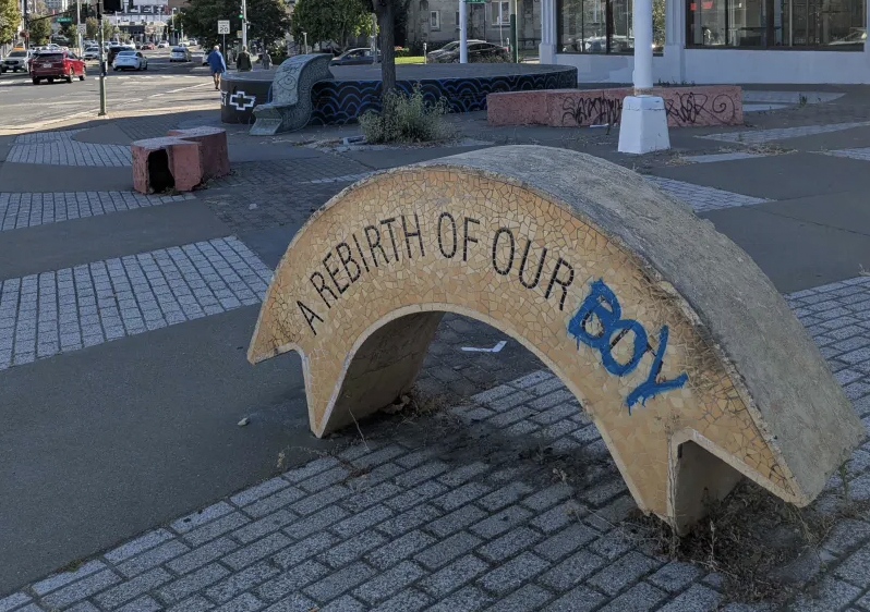 A graffitied street sculpture.