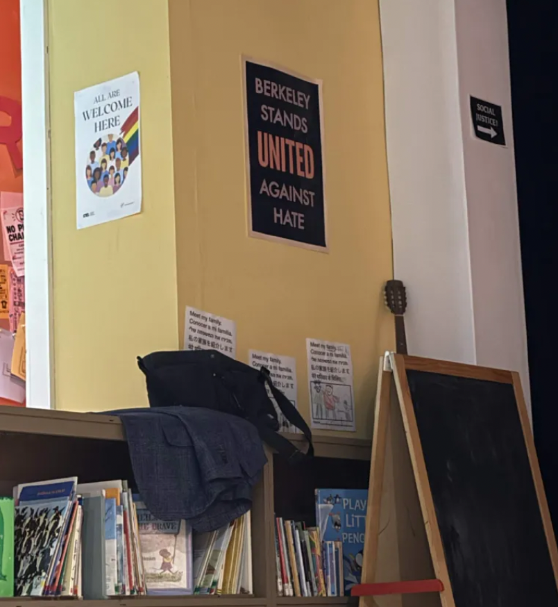 Recreated classroom set with prominent BERKELEY STANDS UNITED AGAINST HATE poster.