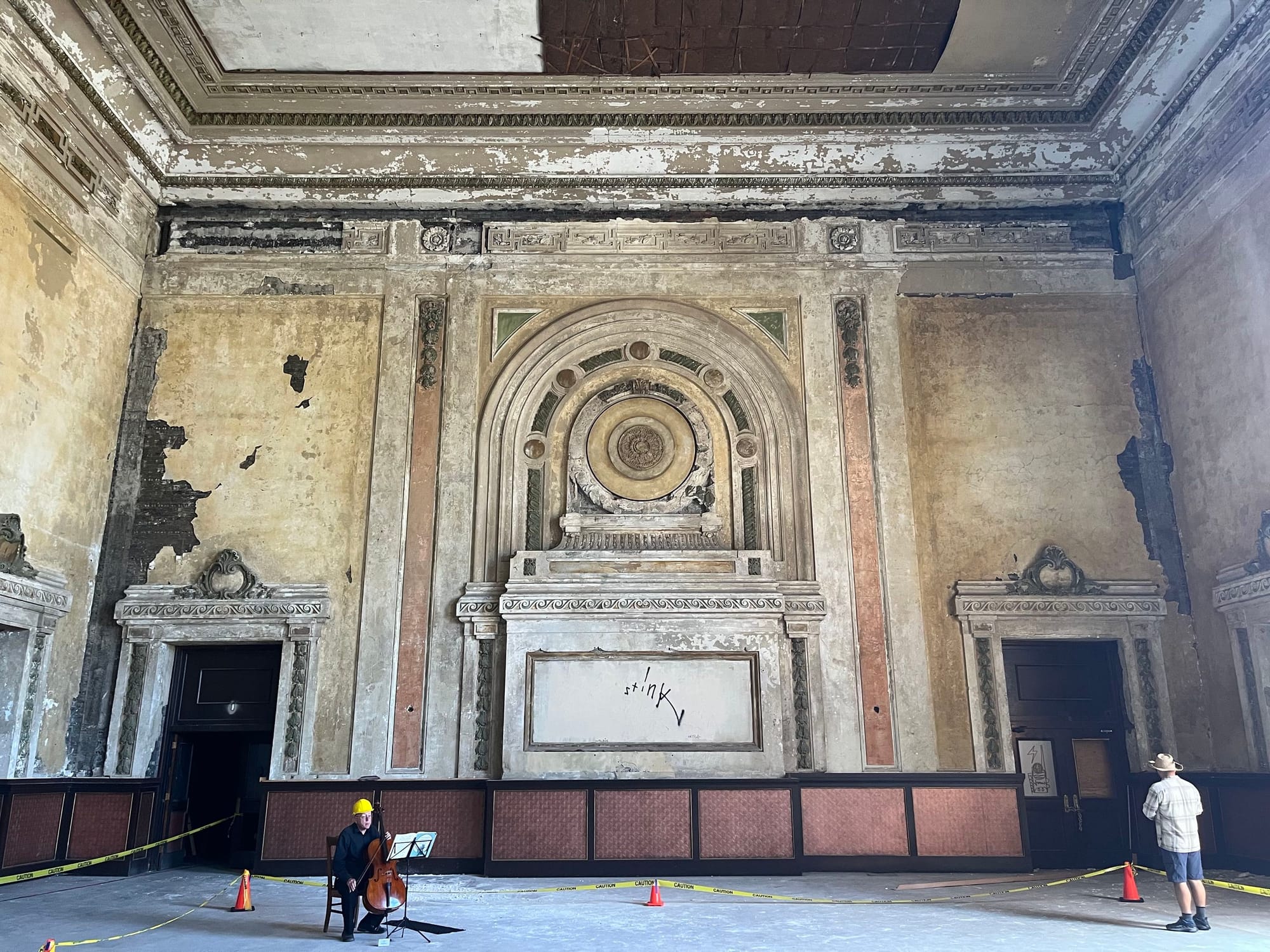 A cellist in the main hall.
