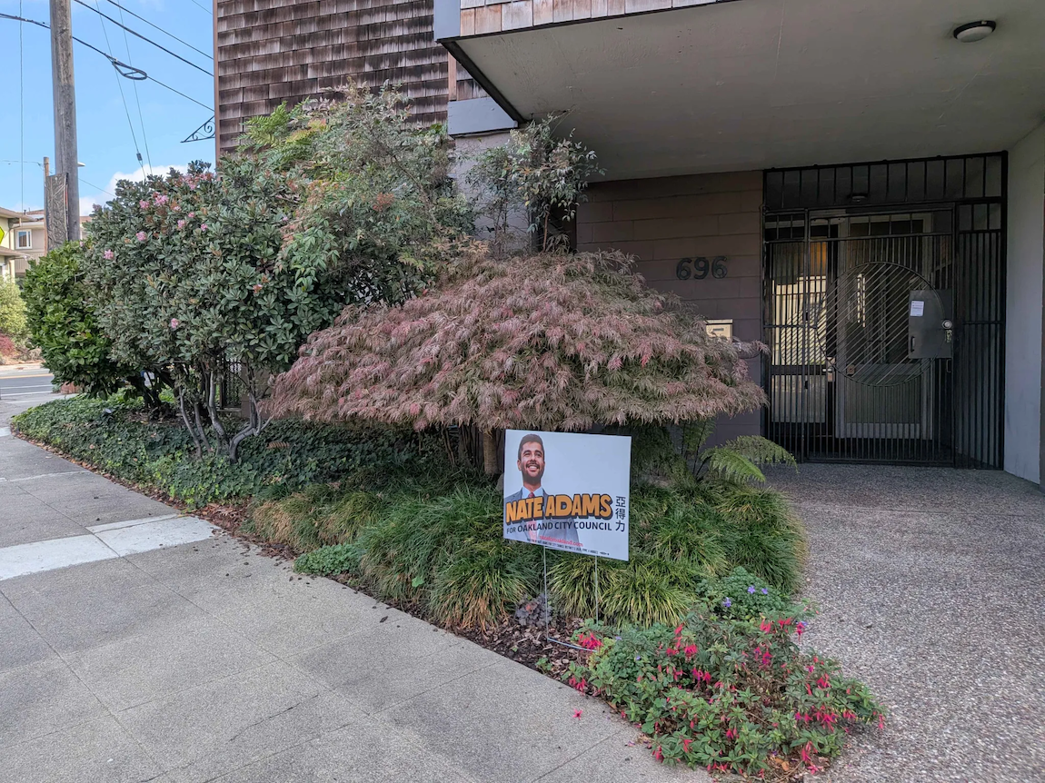 A sign for Nate Adams, candidate for city council.