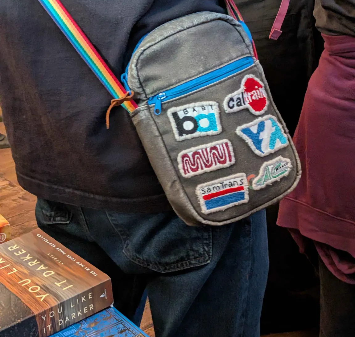 A bag with a bunch of local transit patches—BART, Caltrain, Muni, AC Transit, etc.