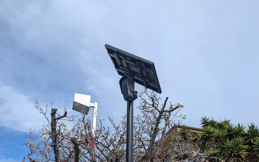 A Flock camera, with the telltale solar panel worn on top like a squadrista's beret.