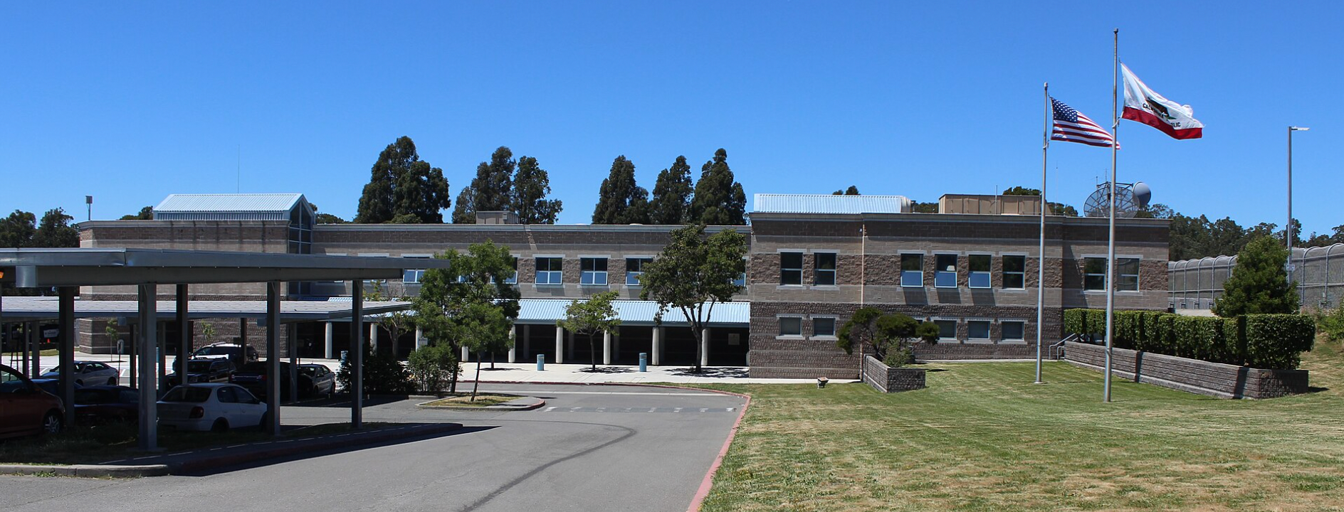 A plac image of West County Detention Center, under a blue California sky.