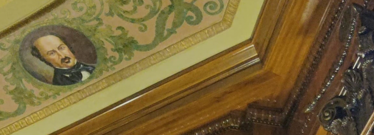John Sutter's face on a fancy Sacramento capitol building ceiling.