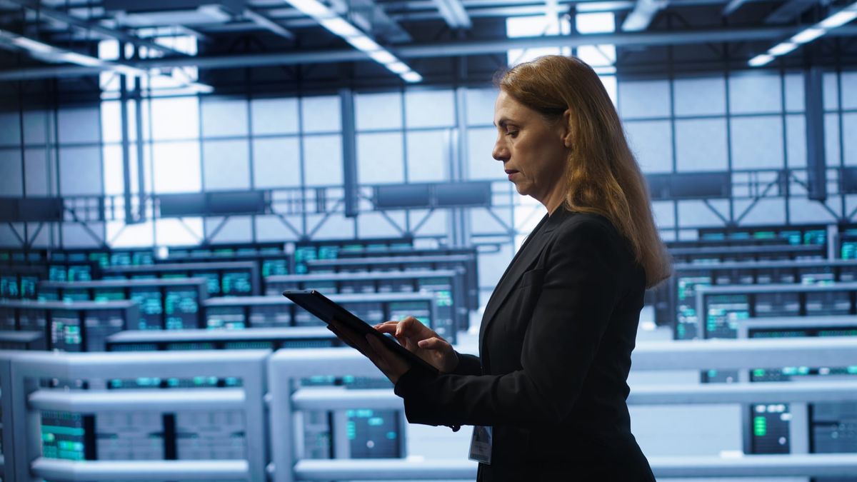 A staff member is reading recent data center legislation updates. 