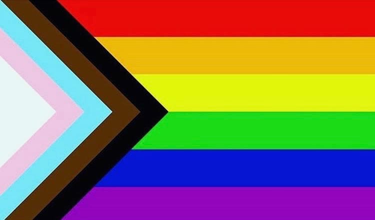 Pride flag that includes trans, people of color, and indigenous people