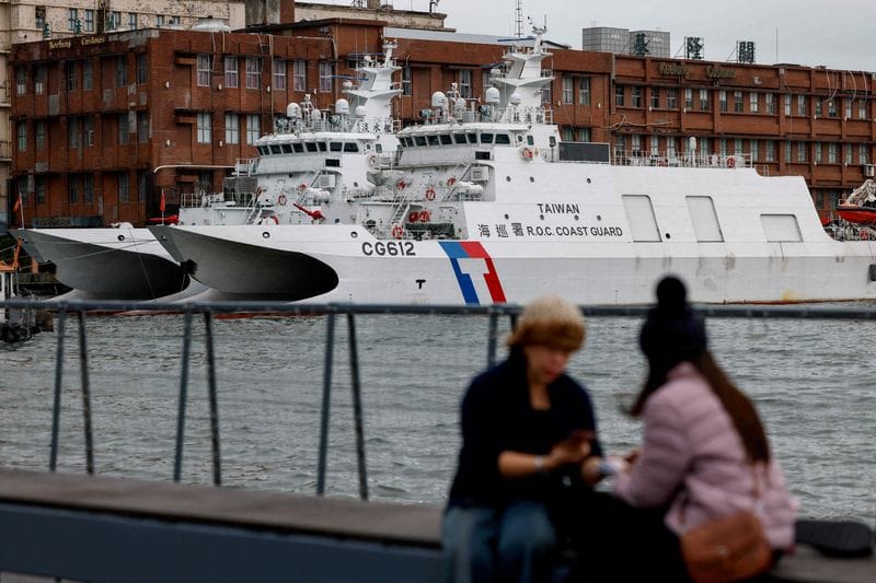 FILE PHOTO: Taiwan Coast Guard patrol vessels are stationed in Keelung, as China conducts "Justice Mission 2025" military drills around Taiwan