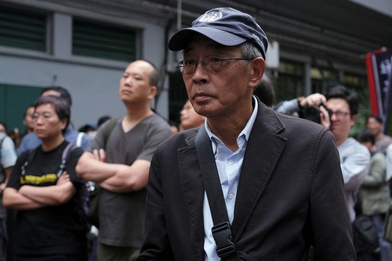 FILE PHOTO: Bookseller Lam Wing-kee marches during a protest to demand authorities scrap a proposed extradition bill with China, in Hong Kong