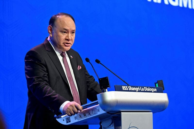 FILE PHOTO: Philippines' Defence Secretary Gilberto Teodoro Jr speaks at the IISS Shangri-La Dialogue security summit in Singapore