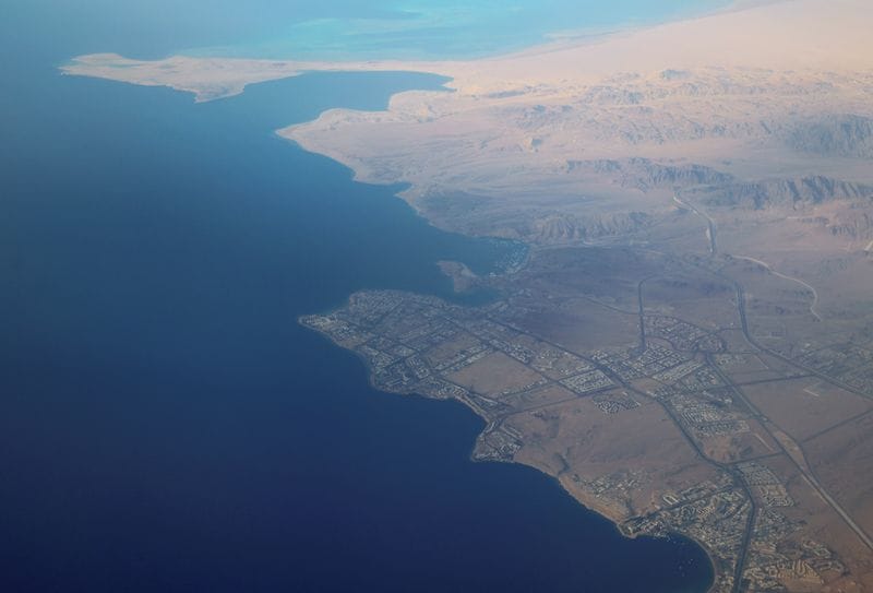 An aerial view of the coast of the Red Sea is seen through the window of an Egyptair airplane, near Sharm el-Sheikh