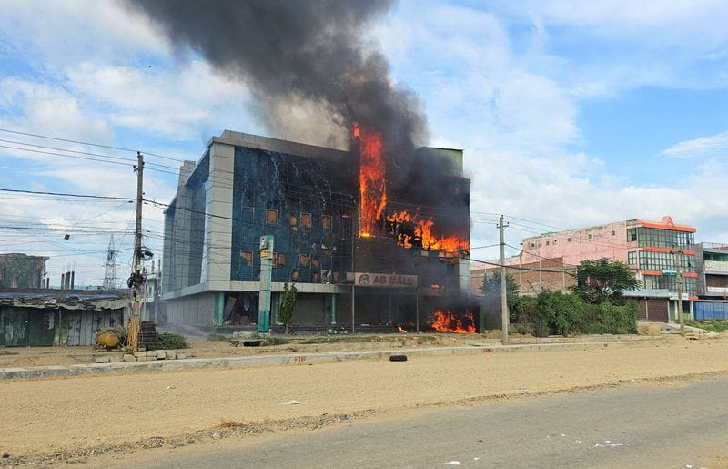Fire at a mall after it was vandalised following a clash between two communities in Siraha