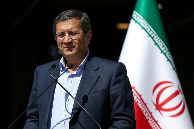 Presidential candidate Abdolnaser Hemmati speaks with journalists before the start of the last election debate, in Tehran