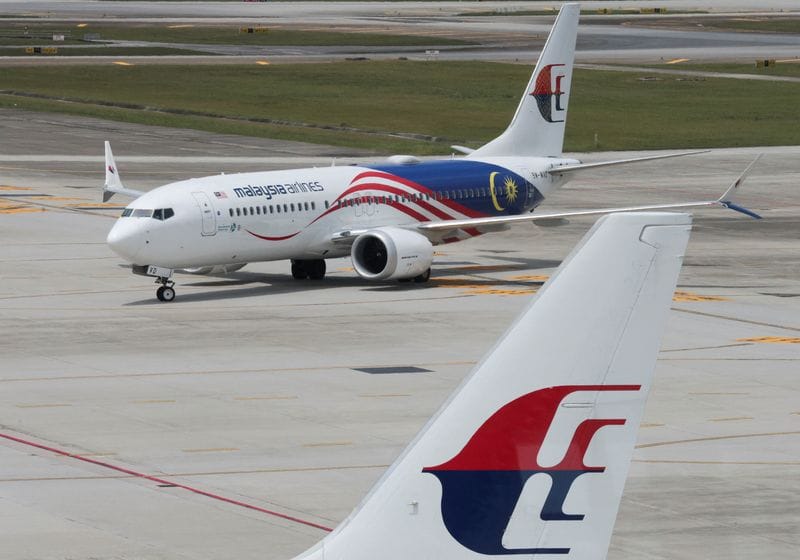 Malaysia Airlines planes are seen on the tarmac of Kuala Lumpur International Airport at Sepang