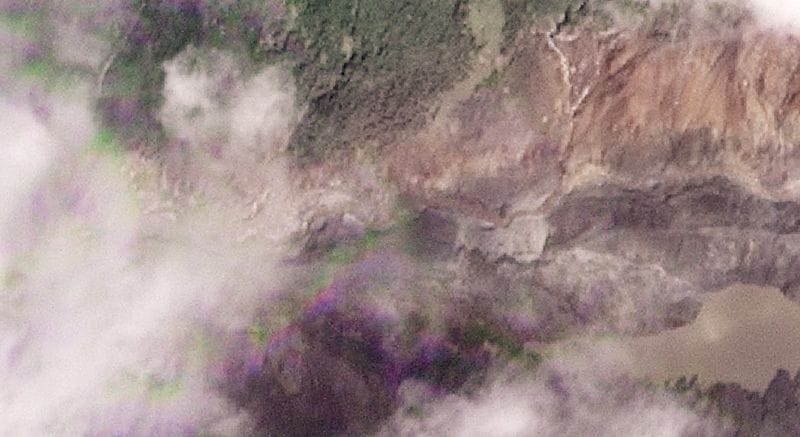 A satellite image shows a barrier lake at the border of Nepal and Tibet Autonomous Region, China, in the aftermath of flash floods and a mudslide